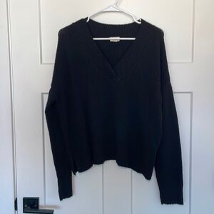 Black, longsleeve sweater. Gently used